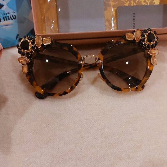 Miu Miu turtoise Sunglasses - Picture 1 of 4